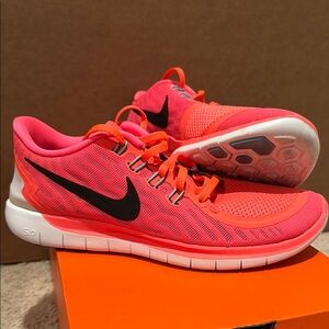 Women’s Nike Free 5.0 
Nike Glow Bright Pink and Orange Athletic Running Shoes